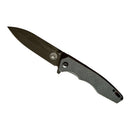The Spaceman Knives Naiad EDC Pocket Knife by Spaceman Knives features a black textured handle and a partially open titanium-plated blade, shown against a white background.