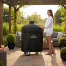 DDR BBQ Supply black water-resistant grill cover for Napoleon 18-inch kettle grill with wheels and buckle straps.