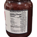 A close-up of a jar of DDR BBQ Supply Sweet Fire BBQ Sauce – 16 oz shows its nutrition facts label, with a serving size of 2 tablespoons (29g) and 50 calories per serving. Ingredients and nutritional info for this sweet and spicy sauce are also visible.