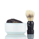 DDR BBQ Supply wet shaving kit with a white ceramic bowl, black-wrapped soap puck, and a black-handled shaving brush.
