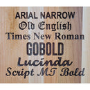 Text in various fonts is engraved on the Two Acre Woodworks Wooden Horse Head Serving Tray With Custom Engraving Options, displaying names like Arial Narrow, Old English, Times New Roman, Gobold, Lucinda, and Script MT Bold in their unique styles.