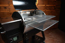Recteq Deck Boss 590 pellet grill equipped with two extended slide-out metal wire racks from the Pimp My Grill® Gen2 Slide-Out Rack System.