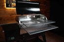 A Recteq Deck Boss 590 with a Pimp My Grill® Gen2 Slide-Out Rack System - 2 Racks installed, showing the lid open and two sliding metal cooking racks extended outward.