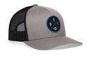 Show off your Michigan pride with the Haka Hat Detroit Football Trucker Hat | Black DET X Snapback. This gray and black trucker hat from Haka Hat features a breathable mesh back and a stylish round front patch in blue and black colors, displaying the letters “DET” alongside a small football graphic. Combining classic snapback style with sporty details, it’s the perfect accessory for any Detroit football fan.
