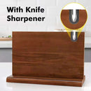 The DDR BBQ Supply Double Sided Magnetic Knife Block with Built-In Sharpener is displayed in a kitchen, featuring a close-up inset of the sharpening slot at the top. Text reads: With Knife Sharpener.
