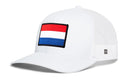White Haka Hat Netherlands Flag International Trucker Hat featuring a rectangular Netherlands flag patch on the front.