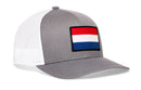Haka Hat Netherlands Flag International Trucker Hat: a grey Dutch trucker hat with a white mesh back and a front patch featuring the red, white, and blue flag of the Netherlands.