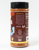 A jar of Chiles & Smoke Sedona Sand Fiesta Seasoning, an all-purpose grilling seasoning from Chiles and Smoke, with product information, usage suggestions, and nutrition facts displayed on the label. This sugar-free BBQ rub pairs perfectly with steak, chicken, pork, and tacos. The label features text and a small cactus graphic.