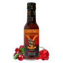 A bottle of Elijah's Xtreme Venomous Strike (Reaper Hot Sauce) by Elijah's Xtreme stands upright, surrounded by cranberries, green leaves, and a red hot pepper against a white background. The label features a coiled snake with bold yellow and orange accents—an enticing sight for any Elijah's Xtreme hot sauce collector or Carolina Reaper hot sauce enthusiast.