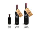 Three bottles of Georgetown Olive Oil Co. Espresso Balsamic Vinegar—crafted to capture the rich flavors of Modena, Italy—in 60ml (2oz), 200ml (6.7oz), and 375ml (12.7oz) sizes. The two larger bottles feature brown tags adorned with coffee bean graphics.