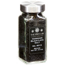 A glass jar with a metal lid contains The Spice Lab Hawaiian Black Lava Salt Medium Grain, labeled as No. 4013 Finishing Salt, Net Wt. 4.5 oz., from The Spice Lab.
