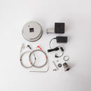 The Flame Boss 400 WiFi Universal Smoker Controller Kit by Flame Boss is shown on a white background with parts for BBQ temperature control, including a metal lid, temperature probe, cables, power adapter, control box, clip, and fittings.