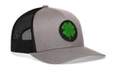 Show off your festive spirit with the Haka Hat Four Leaf Clover Trucker Hat by Haka Hat—a stylish gray and black snapback featuring a bold green four leaf clover patch on the front. Perfect for St. Patrick’s Day or adding a touch of lucky charm to any outfit!.