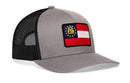 Gray Haka Hat Georgia Flag Trucker Hat with a black mesh back and a patch on the front.
