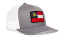 Gray and white Haka Hat Georgia Flag Trucker Hat with a mesh back and a state flag patch on the front.
