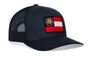 Dark blue Haka Hat Georgia Flag Trucker Hat featuring a mesh back and a patch of the state flag on the front.