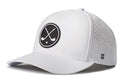 Introducing the Haka Hat Crossed Clubs Performance 5-Panel Hat, a white Flexfit snapback by Haka Hat. This golf hat features a black circular logo with two crossed golf clubs and a golf ball, plus ventilation holes on the sides for enhanced breathability and a subtle H logo near the brim.