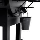 A close-up of the Green Mountain Grills Peak Prime 2.0 Wi-Fi Controlled Pellet Grill by Green Mountain Grills, featuring a black metal design, large cooking area, and small ash bucket beneath, all set against a white background.