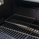 Green Mountain Grills warming rack shown with backboard in pellet grill. 
