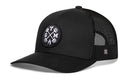 The Haka Hat GYM Trucker Hat is a black workout snapback featuring a curved brim, mesh back for ventilation, and a front patch with crossed barbells, YGM lettering, a flame icon, plus a small H tag on the side. Brand: Haka Hat.