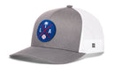 The Haka Hat Los Angeles Trucker Hat is a gray and white snapback with a blue LA X baseball patch featuring a palm tree, mesh back, and curved brim for classic style.