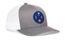 The Haka Hat Los Angeles Trucker Hat is a gray and white snapback featuring a blue LA X baseball patch with a palm tree, bats, and ball. Its white mesh back provides breathable comfort. Brand: Haka Hat.