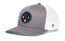 The Haka Hat Miami Trucker Hat, a gray and white snapback by Haka Hat, features a mesh back and a front patch with blue trim, crossed red and blue lines, MIA letters, and a baseball graphic. Classic trucker cap style.
