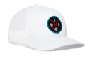 The Haka Hat Miami Trucker Hat is a white mesh snapback with a round front patch featuring blue trim, red crossed lines, M I A lettering, and a small baseball graphic.