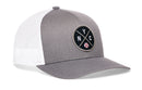 The Haka Hat New York Trucker Hat | NYC X Baseball Snapback features a gray and white mesh back design with a round front patch showing NYC and a baseball graphic—ideal for fans of classic baseball style.