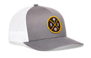 The Haka Hat San Diego Trucker Hat | SD X Baseball Snapback features a grey and white design with a yellow-bordered patch showing a palm tree, S and D letters, and baseball. Mesh back adds breathability.