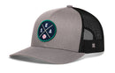 The Haka Hat Seattle Trucker Hat | SEA X Baseball Snapback features a gray and black design, round embroidered SEA/bats/baseball patch, black mesh back, and a signature Haka 5.0 H logo on the side.