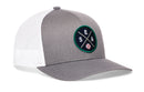 The Haka Hat Seattle Trucker Hat is a gray and white snapback featuring a circular patch with crossed lines, the letters SEA, a baseball on the front, and showcases the Haka signature 5.0 style.