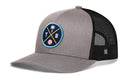 The Haka Hat Tampa Bay Trucker Hat features a gray and black mesh snapback and a round patch with a palm tree, crossed bats, TB initials, and a baseball—perfect for any Tampa Bay fan.