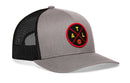The Haka Hat Atlanta Trucker Hat is a gray and black snapback with a mesh back and a round front patch featuring "ATL" and a red, yellow, and black basketball.