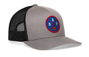 The Haka Hat Detroit Trucker Hat is a gray and black snapback with a mesh back, circular DET X Basketball patch featuring blue and red details, a basketball icon, and a comfort-fit sweatband for all-day wear.