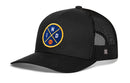 The Haka Hat Indiana Trucker Hat is a black mesh snapback with a front round patch, featuring yellow trim, blue background, IND letters, and a small basketball at the bottom center.