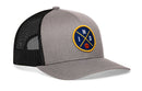The Haka Hat Indiana Trucker Hat is a gray and black snapback with a mesh back and a round blue-yellow IND patch with a red basketball on the front.