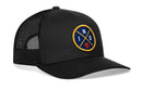 The Haka Hat Indiana Trucker Hat is a black mesh snapback featuring a round blue and yellow patch with crossed lines, the letters I, N, D, and a small basketball icon on the front.