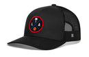 The Haka Hat Los Angeles Trucker Hat is a black mesh snapback featuring a round patch with red border, palm tree, “L” and “A” letters, basketball icon, and blue crossed lines on black. Brand: Haka Hat.