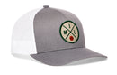 The Haka Hat Milwaukee Trucker Hat | MIL X Basketball Snapback features a gray and white design with mesh back, snapback closure, and a round front patch with crossed lines, M, I, L letters, and a small basketball.