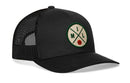 The Haka Hat Milwaukee Trucker Hat | MIL X Basketball Snapback is a black mesh trucker hat with a snapback closure and a round front patch featuring green borders, crossed lines, M, I, L letters, and a small red basketball.