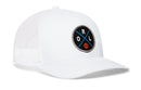The Haka Hat Orlando Trucker Hat features a white mesh design and a round black patch with blue crossed lines, the letters ORL, and an orange basketball.