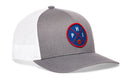 The Haka Hat Philadelphia Trucker Hat features a gray and white design with a circular blue and red PHI X basketball patch, embroidered on the front.