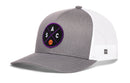 The Haka Hat Sacramento Trucker Hat | SAC X Basketball Snapback features a gray and white design, mesh back, curved brim, snapback closure, and a front black patch with S, A, C letters and an orange basketball.