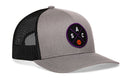 The Haka Hat Sacramento Trucker Hat features a gray and black mesh design with a snapback closure, plus a front patch bordered in purple displaying "SAC" and a small basketball.
