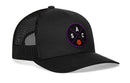 The Haka Hat Sacramento Trucker Hat (SAC X Basketball Snapback) is a black mesh trucker hat with a round patch showing intersecting lines, SAC letters, an orange basketball, and features an adjustable snapback for comfort.