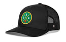 The Haka Hat Seattle Trucker Hat features a black mesh back, adjustable snapback, and a green and yellow round patch with crossed yellow lines, "SEA" lettering, and a basketball graphic on the front.