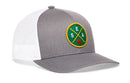 The Haka Hat Seattle Trucker Hat | SEA X Basketball Snapback by Haka Hat features a sporty gray and white design with a round green and yellow SEA patch and small basketball—perfect for fans seeking classic Seattle trucker hat style.