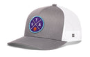 The Haka Hat Utah Trucker Hat | UTA X Basketball Snapback features a gray front with a round purple UTA patch and orange basketball, plus white mesh at the back in Haka Hat’s signature 5.0 trucker style.
