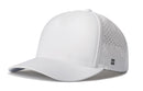 The Haka Hat Blank Performance 5-Panel Hat by Haka Hat features a curved brim, back panel perforations for ventilation, a Flexfit® sweatband, snapback closure, and a subtle H logo near the back edge.
